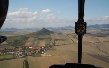 Let ve vrtulníku nad Řípem